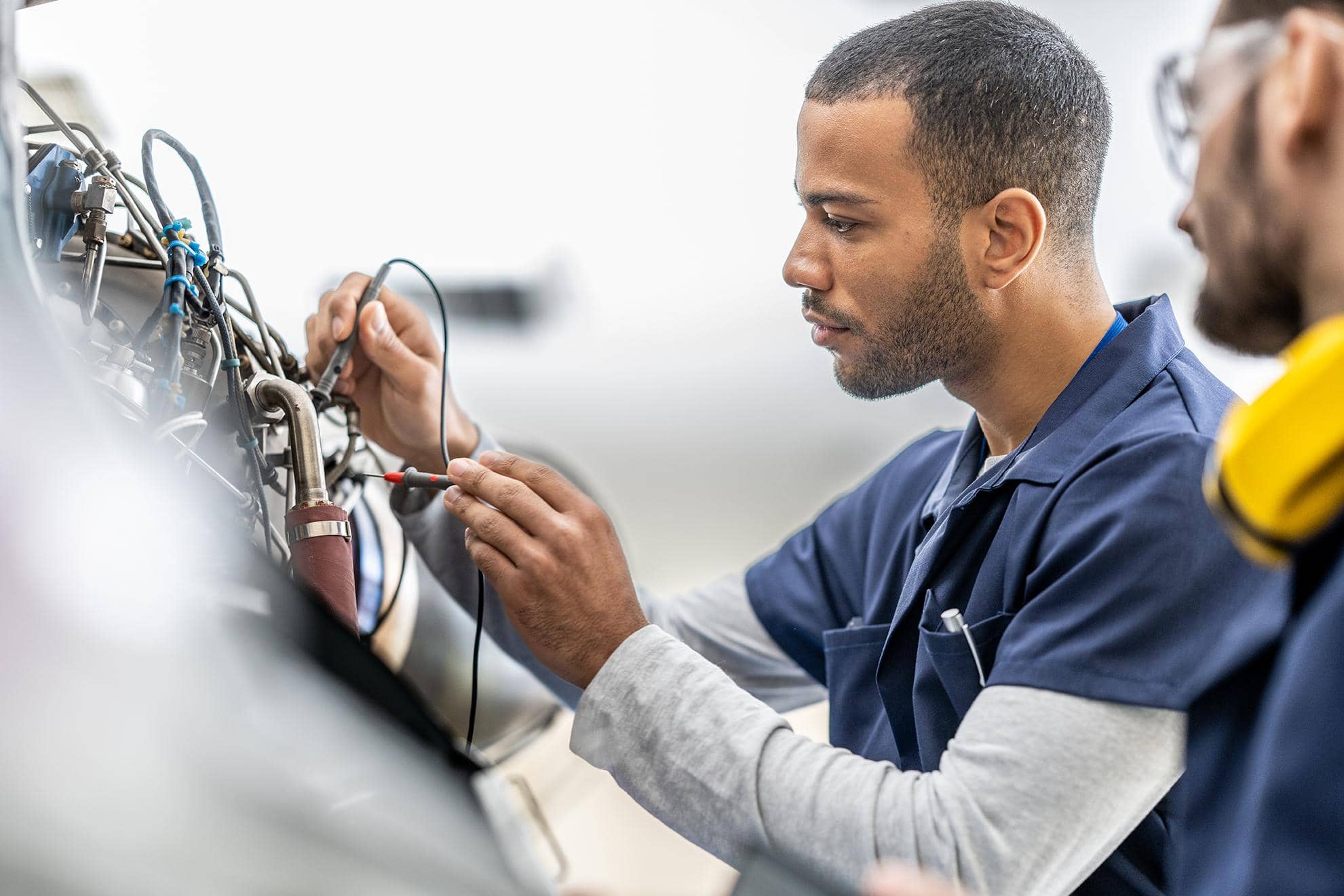 Engineers working on aircraft aeroplane