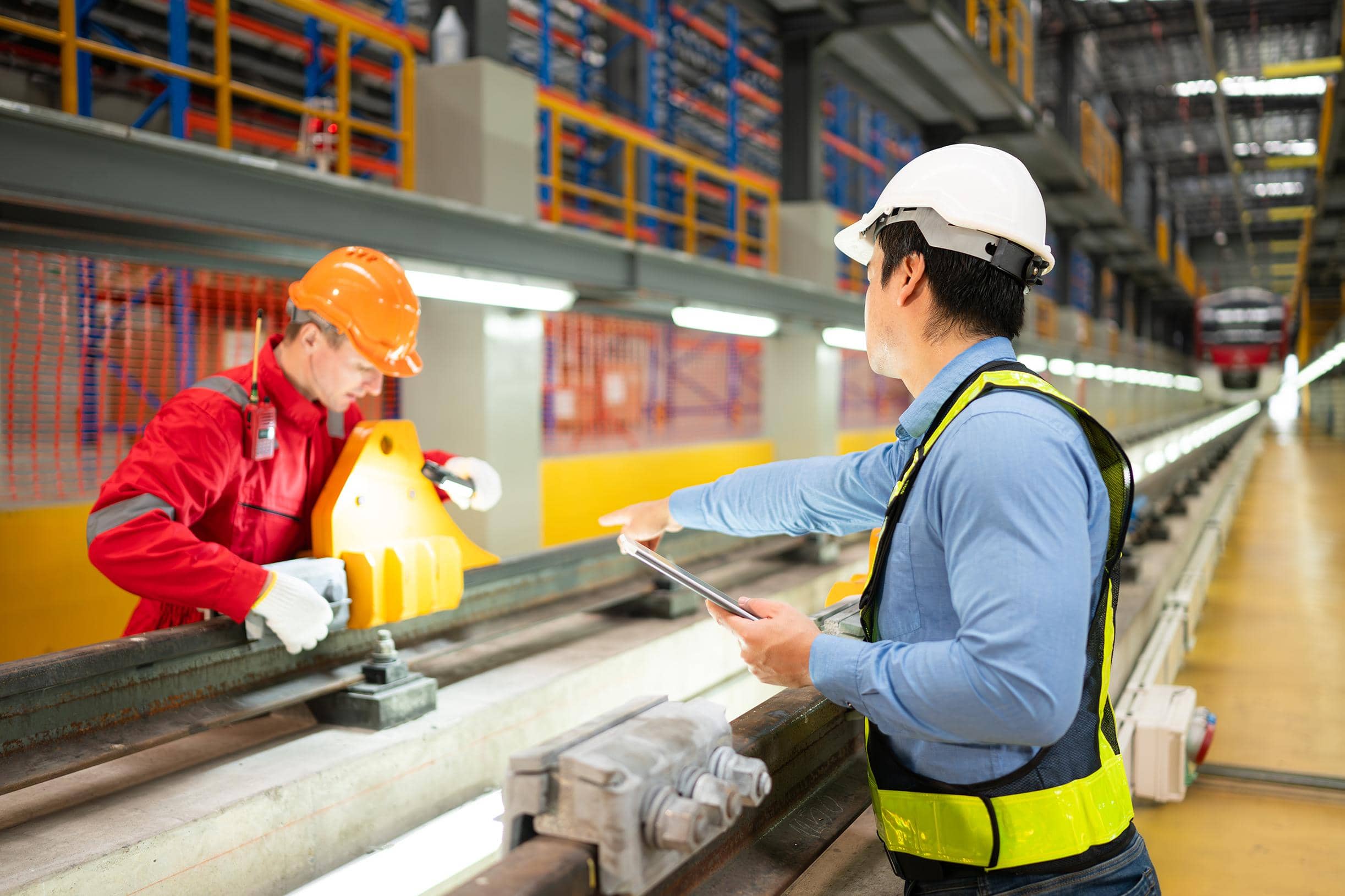 Engineers assessing rail track