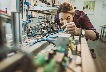 Engineering student  working with electronics