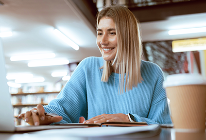 PHD student studying in library