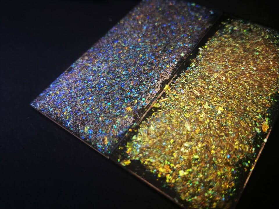 1 Blue and gold glitter prepared from peeled large scale films